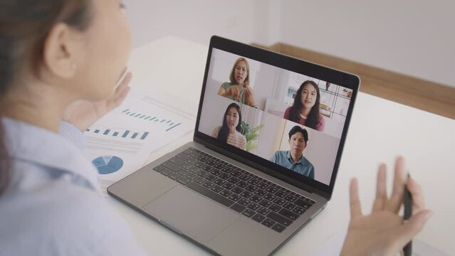 Bad toxic team video call work argue point face stress rude yelling anger hate speech at male coworkers. Asia people man woman fight on laptop meeting at office upset mad bossy worker career job issue