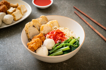 egg noodles with fish balls and shrimp balls in pink sauce, Yen Ta Four or Yen Ta Fo