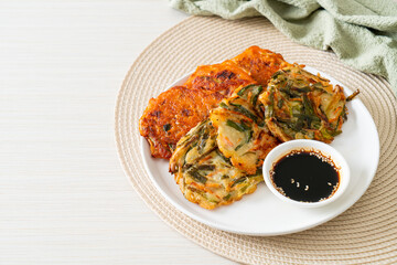 Pajeon or Korean pancake and Korean Kimchi pancake or Kimchijeon on white background