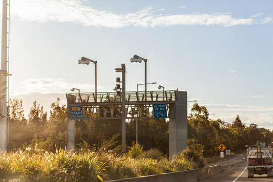 warm light over e tag toll point on highway entrance in Sydney