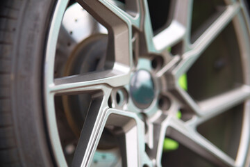 beautiful black alloy wheels made of aluminum on a dark background. exclusive wheels for expensive cars
