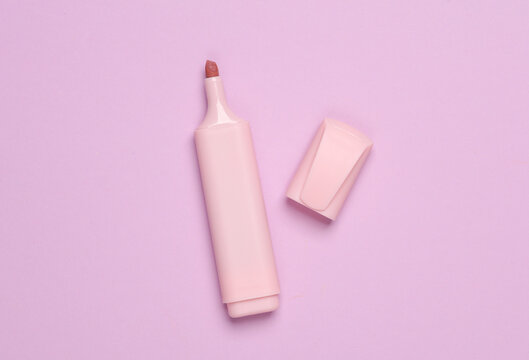 Marker or colored felt-tip pen on a pastel background. Top view. Creative layout