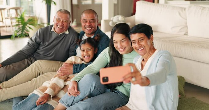 Family, blowing kiss and funny selfie in home living room, bonding and relax together. Children, parents and grandparents with profile picture, laughing and happy memory for social media in house