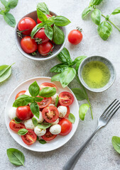 Caprese salad with tomatoes, mozzarella and basil.