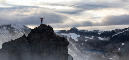 Adventurous Woman Standing on top of Mountain Cliff. Extreme Adventure Composite