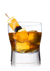 Glass of old fashioned cocktail on white background.