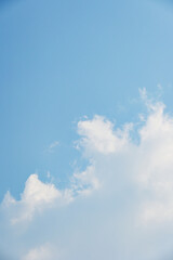 beautiful blue sky and white fluffy cloud with sunrise in the morning, natural background