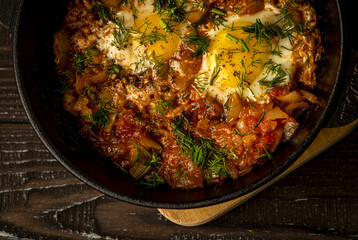 Delicious Shakshuka: A savory Middle Eastern egg dish featuring poached eggs in a rich tomato and bell pepper sauce