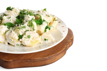 Plate of tasty Potato Salad with greens on white background, closeup