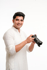 Indian Photographer With Camera on white background.