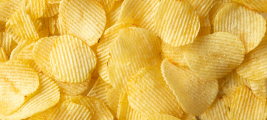 crispy golden potato chips snack texture background
