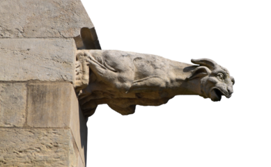 A gargoyle at the Nevers Cathedral (in France) isolated on the transparent background