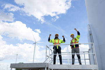 Success engineer team gladfull raised hands after finish working service build new wind turbine eco power clean energy infrastructure