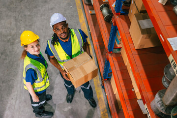 cargo warehouse worker happy working in warehouse shipping logistics industry delivery products...