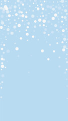 Magic falling snow christmas background. Subtle flying snow flakes and stars on light blue winter backdrop. Magic falling snow holiday scenery.   Vertical vector illustration.