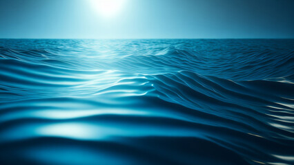 Blue sea water surface with waves and sun light.