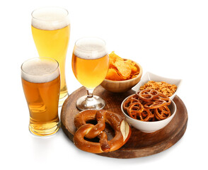 Glasses of cold beer and different snacks on white background. Oktoberfest celebration