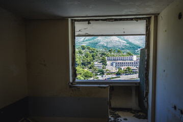 View form ruined room in so called Bay of Abandoned Hotels in Kupari, Croatia
