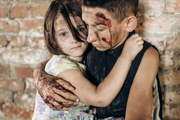 The brother hides in the arms of the sister during the collapse of the building.A sister hides in...