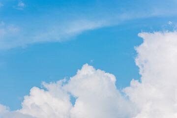 Naklejka na ściany i meble Blue sky and white clouds in the sky