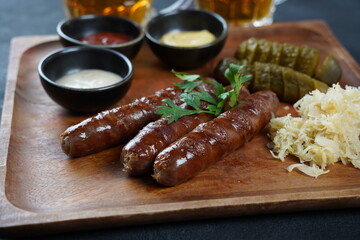 Fried sausages from Nuremberg with sauerkraut and horseradish Bavarian beer garden meal