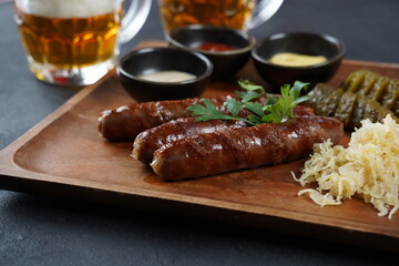 Fried sausages from Nuremberg with sauerkraut and horseradish Bavarian beer garden meal