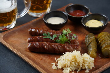 Fried sausages from Nuremberg with sauerkraut and horseradish Bavarian beer garden meal