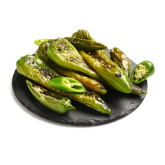 Slate board with grilled chili peppers on white background