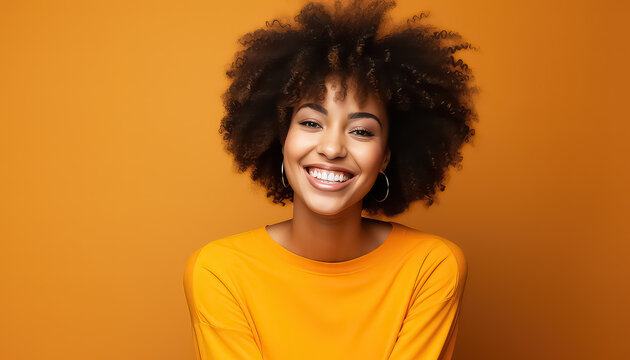 Portrait Of Beautiful African Woman Standing Against Orange Background