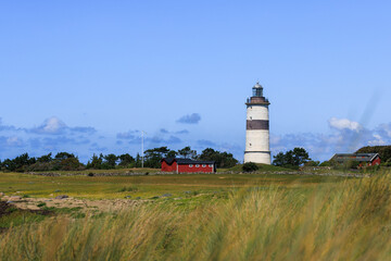 Fototapeta na wymiar lighthouse on the coast of the country