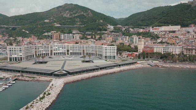 aerial view from the drone of the Gulf of Salerno with its commercial port, the crystal clear sea, the castle of Arechi, Piazza of Libert&agrave;