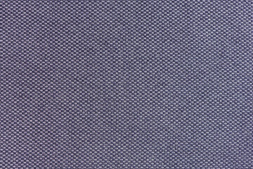Violet weaving material fabric texture. Plain weave textile. Basket weave pattern of complex novelty yarns. Closeup view.