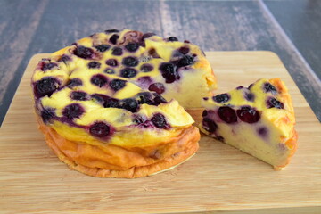 Blueberry yogurt cake on wooden board