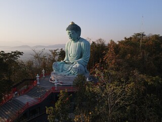 The Great Buddha (Daibutsu)stucco buddha at the Wat Doi Phra Chan Buddhist temple the city of Mae Tha in Lampang,Thailand.

