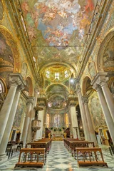  GENOVA, ITALY - MARCH 5, 2023: The nave of baroque church Chiesa di Santa Maria Maddalena. © Renáta Sedmáková