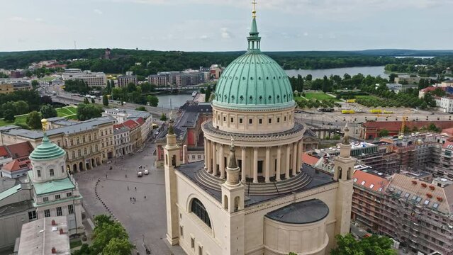 Aerial Drone shot of Church of St. Nikolaus ( St. Nikolaikirche ) on the Old Market Square ( Alter Markt ) in Potsdam , Germany