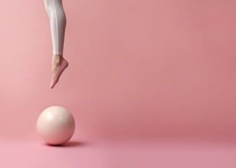 Fototapeta na wymiar Legs of a woman, jumping on pilates ball against pink background. Sport, activity, fitness concept, with copy space. AI generative. illustration