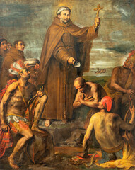 GENOVA, ITALY - MARCH 6, 2023: The painting of St. Francis Solano Baptizing indians  in the church Basilica della Santissima Annunziata del Vastato by GIovanni Battista Carlone (1603 - 1684)