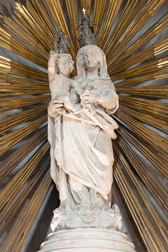 GENOVA, ITALY - MARCH 6, 2023: The marble statue of Madonna in the church Basilica della Santissima Annunziata del Vastato by Leonardo Mirano (1577 1637).