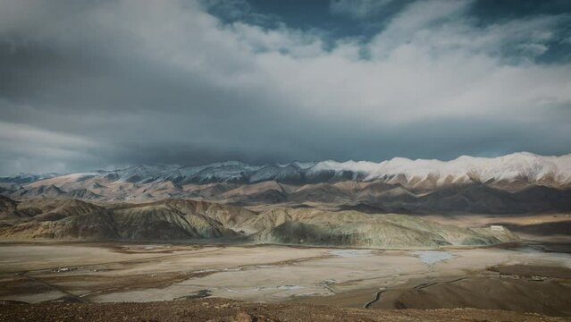 An enchanting time-lapse shows the ever-changing moods of Ladakh's skies, casting shadows on the Indus River and Hanle Monastery. Multilayered, snowcapped mountains are also seen in the distance