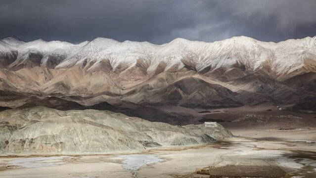 An enchanting time-lapse shows the ever-changing moods of Ladakh's skies, casting shadows on the Indus River and Hanle Monastery. Multilayered, snowcapped mountains are also seen in the distance