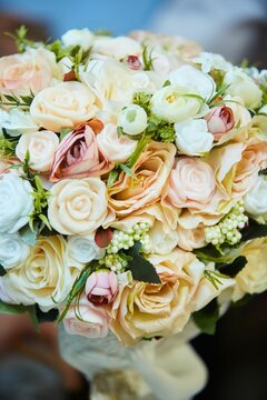 Bright wedding bouquet for the ceremony from fresh flowers