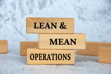 Lean and mean operations text on wooden blocks. Business strategy concept