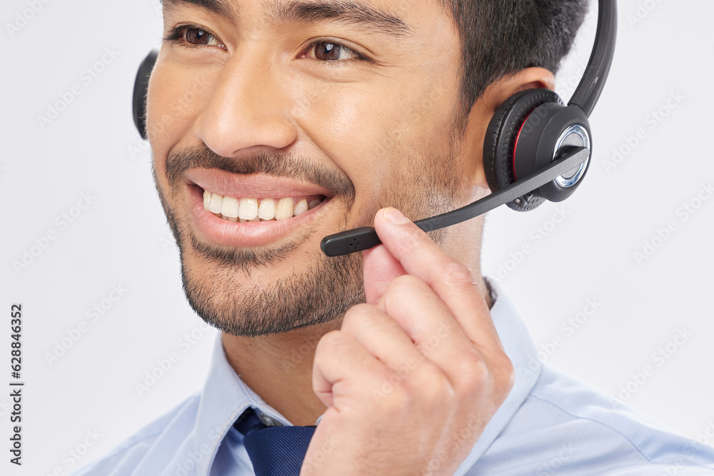 Poster Face, smile and headset with a call center man in studio on a white background for customer service or support. Contact us, crm and consulting with a happy male employee talking for assistance