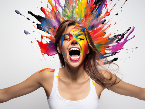 Woman with exploding colors on face and  in background