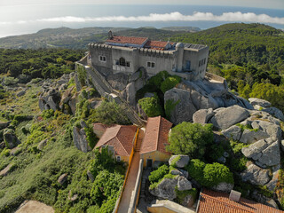 The Santuario da Peninha and Palace - Sintra, Portugal near Lisboa. Aerial drone view. Flying over. High quality photo