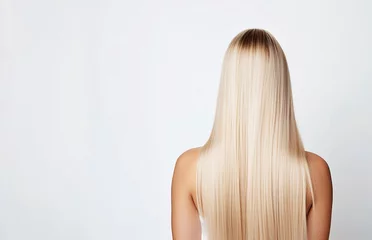 Photo sur Plexiglas Salon de beauté Rearview shot of a young woman with long silky blonde hair