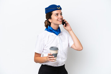 Airplane stewardess caucasian woman isolated on white background holding coffee to take away and a mobile