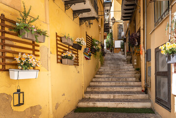 Colorful Narrow street with stairs of the old town of Agrigento, Sicily, Italy