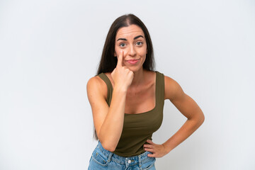 Obraz premium Young caucasian woman isolated on white background showing something